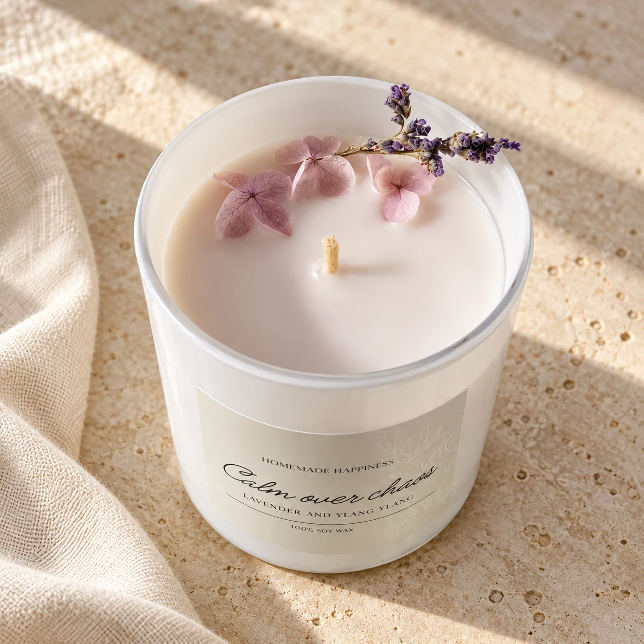 Close-up of lavender and dried petals on Calm Over Chaos candle